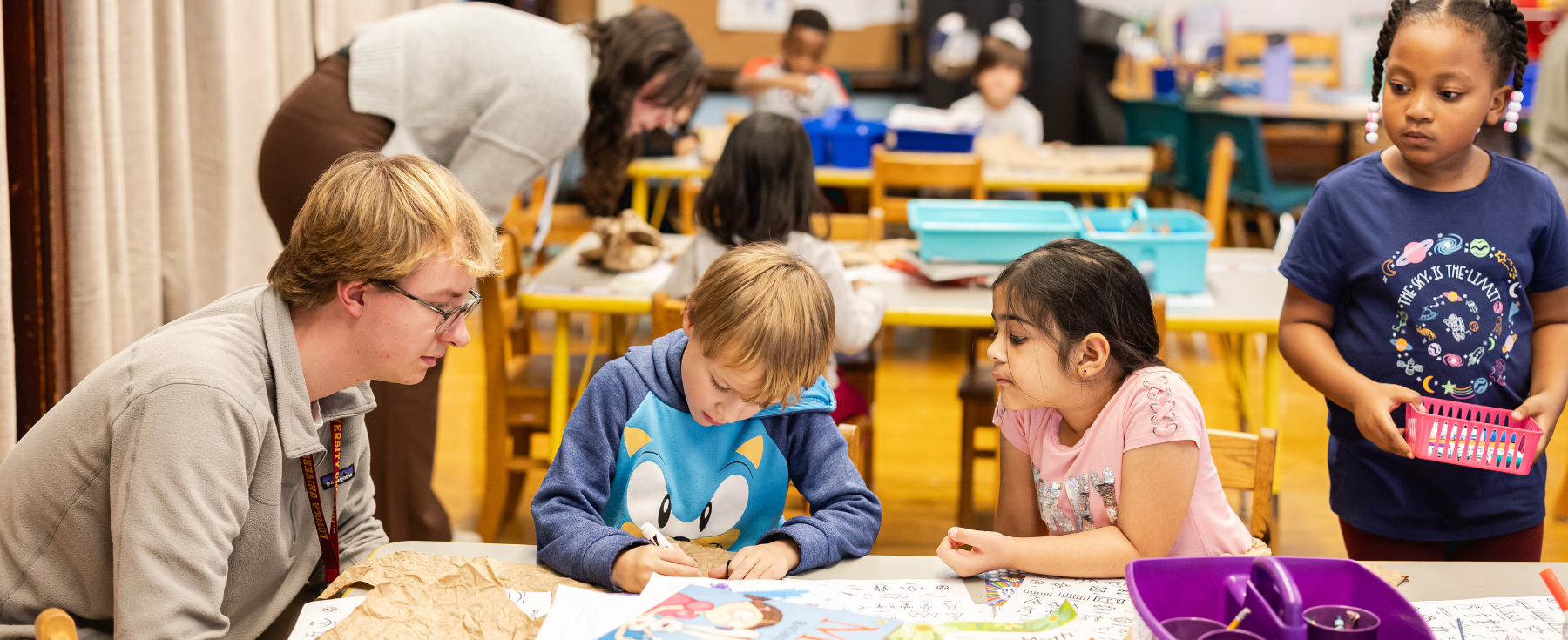 A Loyola student working in an elementary classroom